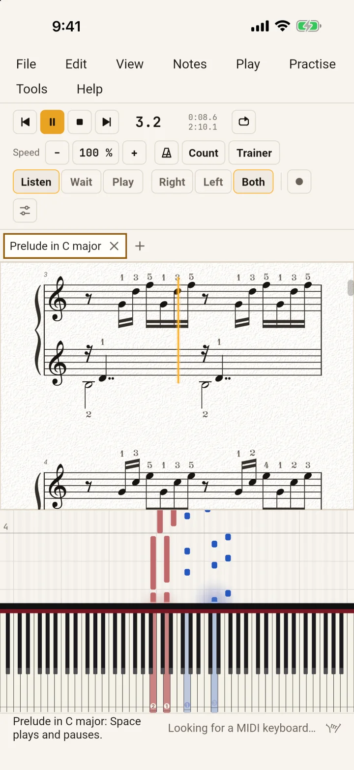 PianoLab on an iPhone, playing: the score above and the notes falling onto the keyboard below.
